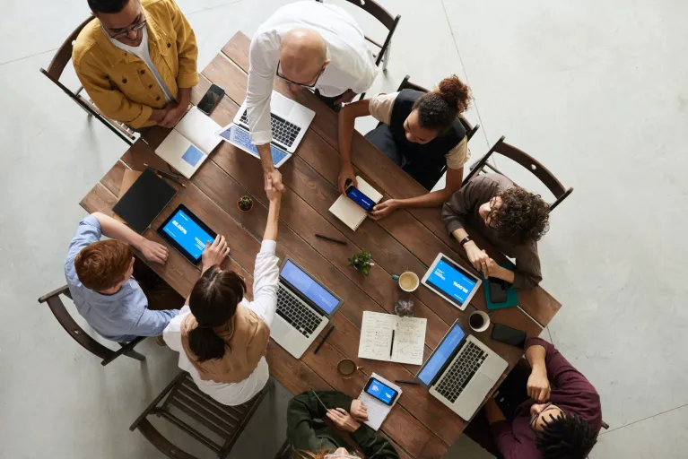 Importance Of Advisory Services In Merger And Acquisition, team discussing in office